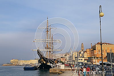 The three masted Palinuro, a historic Italian Navy training barquentine, moored in the Gaeta port. Editorial Stock Photo